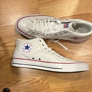 Converse White High-Tops with Red and Blue Accents
